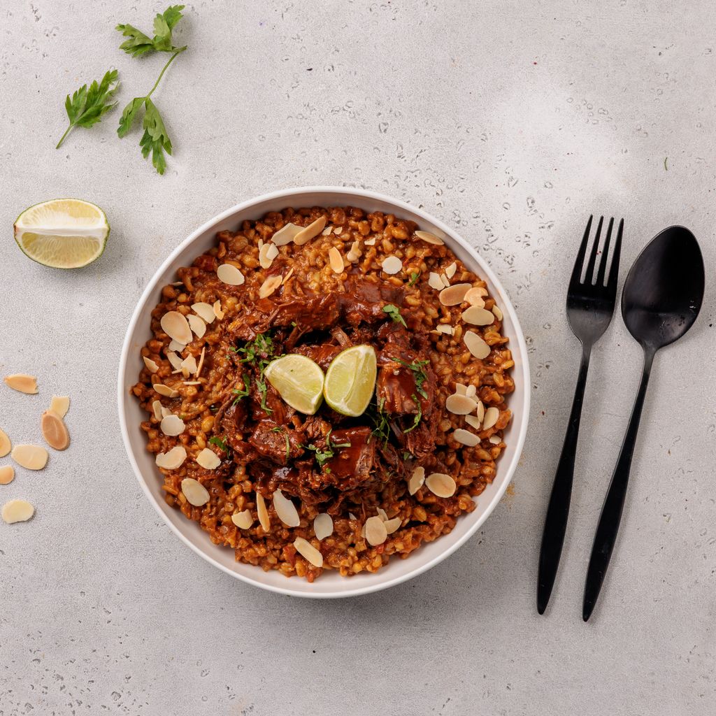 فريك بالطماطم والبهارات مع اللحم