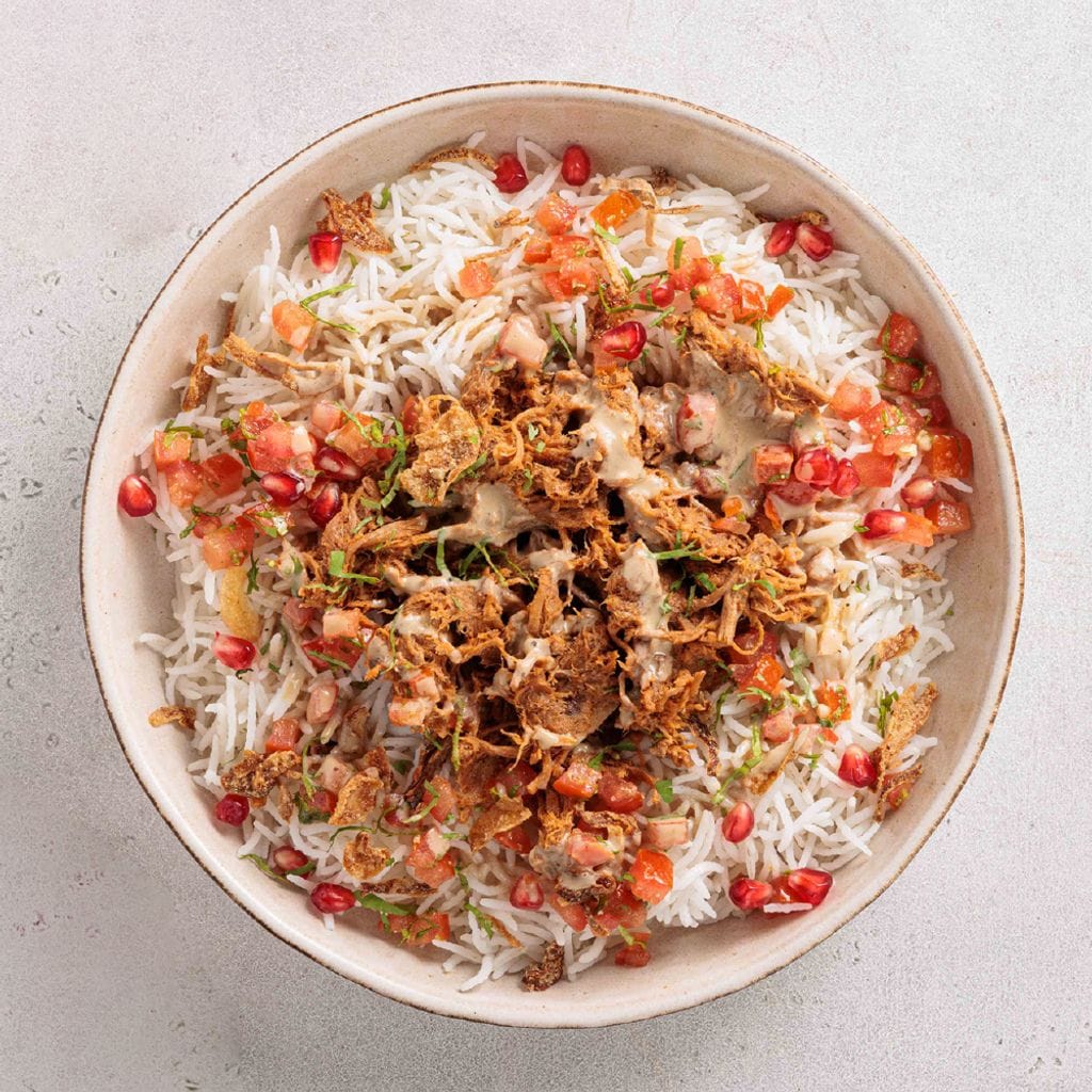 الأرز واللحم مع الصوص الحامض